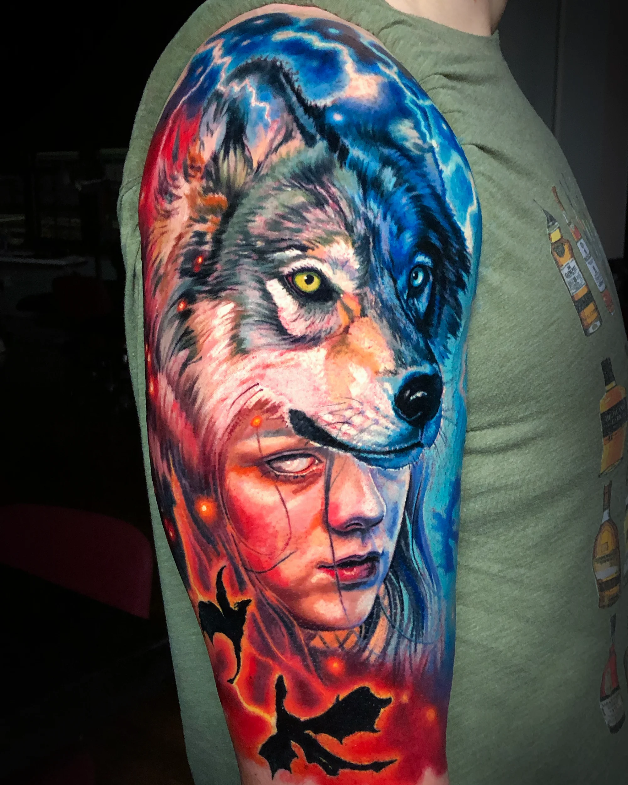 Color realism Arya Stark direwolf Game of Thrones upper arm tattoo by Austin tattoo artist Bobby Cupparo