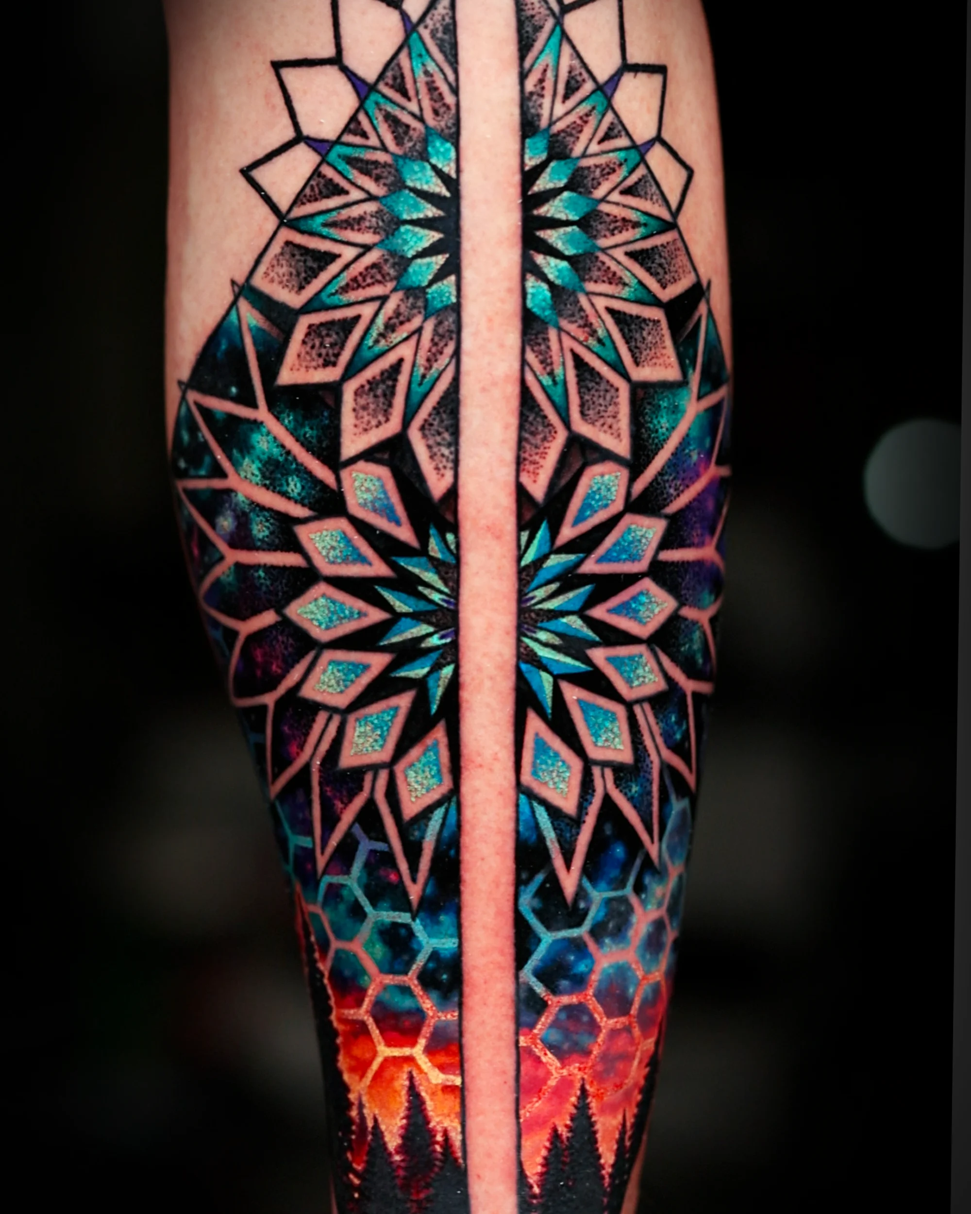 Geometric galaxy mandala shin tattoo