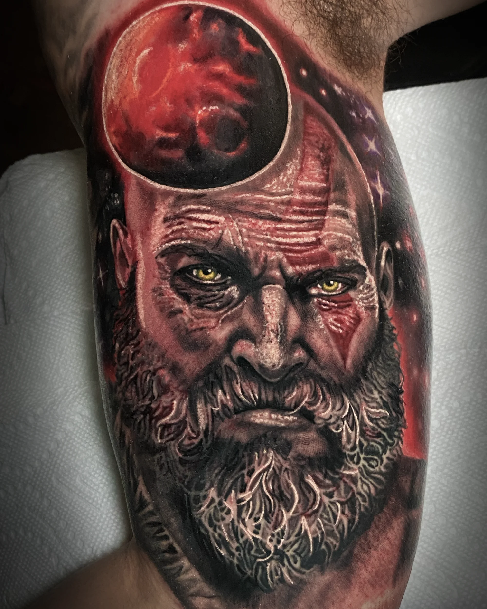Kratos God of War calf tattoo — follow on Instagram by Austin tattoo artist Bobby Cupparo