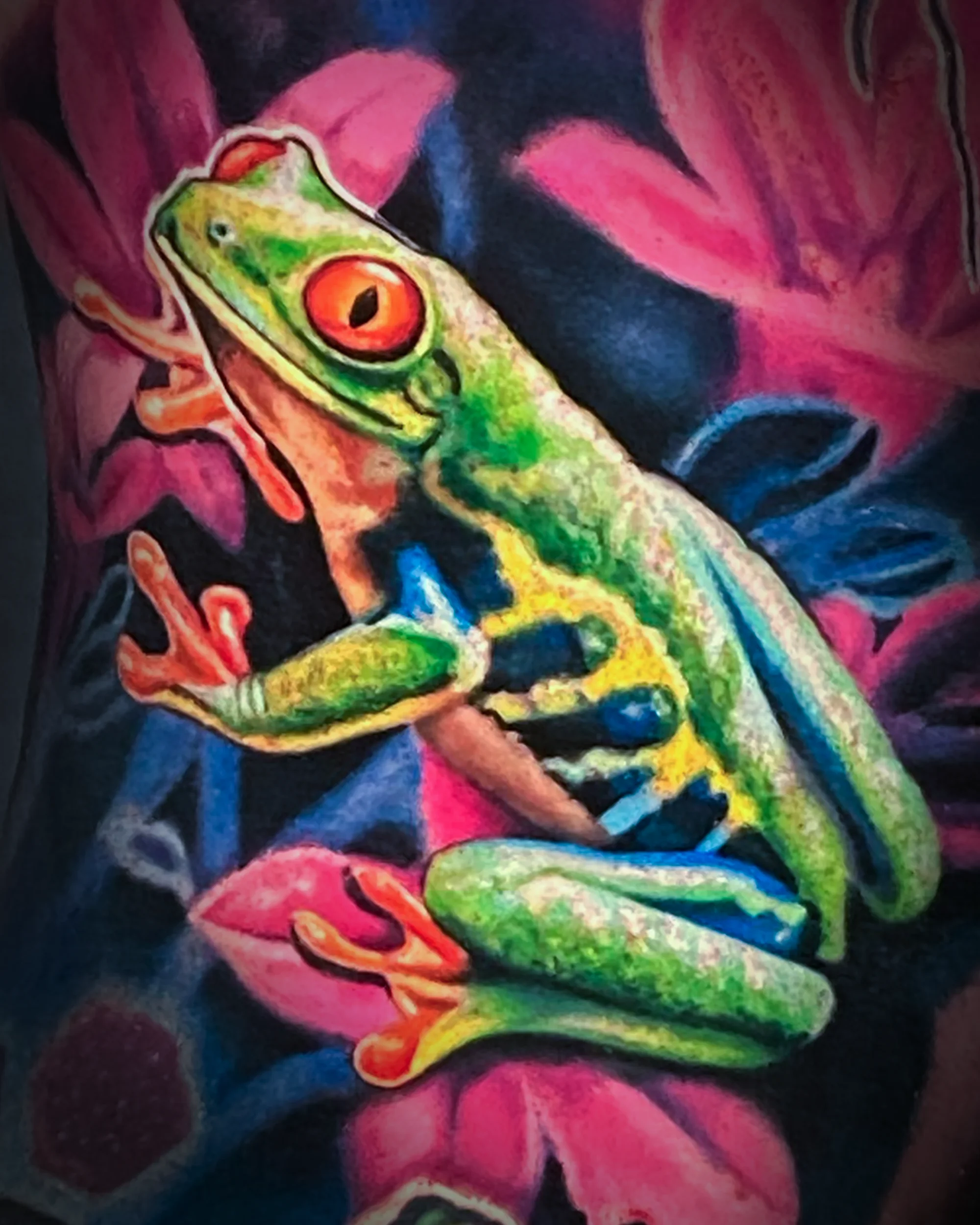 Color realism red-eyed tree frog tropical sleeve tattoo by Austin tattoo artist Bobby Cupparo