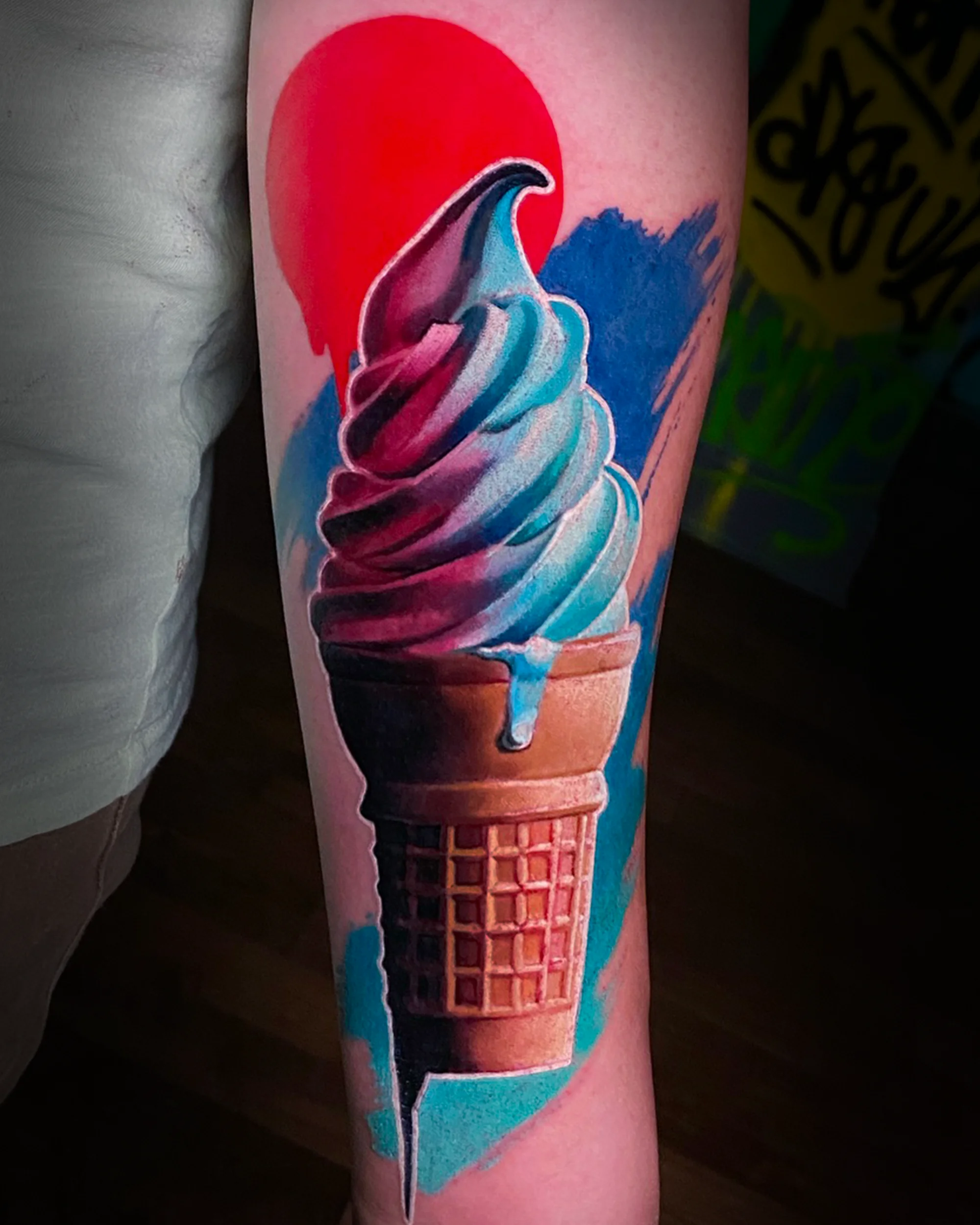 Color realism skull ice cream cone forearm tattoo by Austin tattoo artist Bobby Cupparo