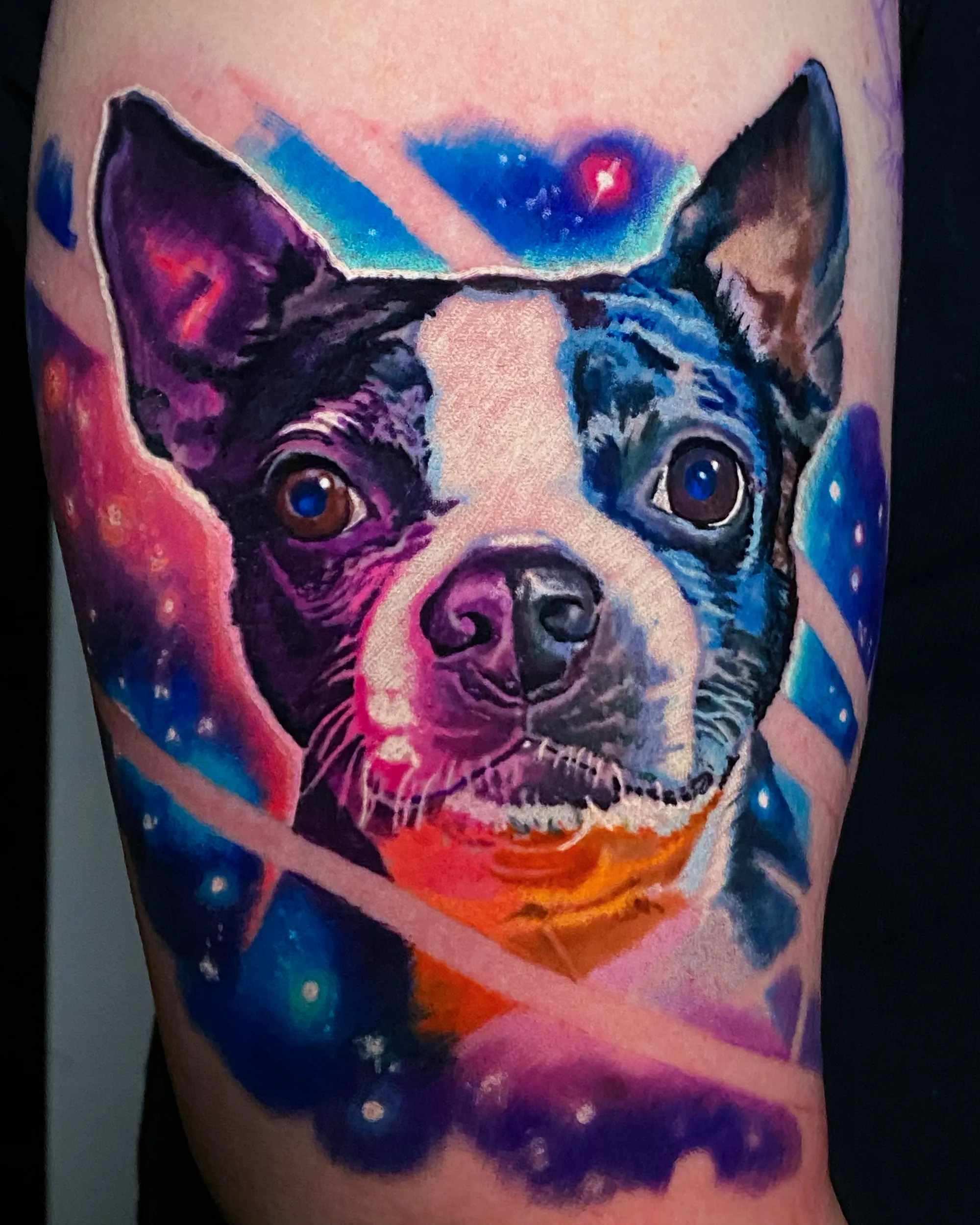 Surreal color Boston Terrier dog portrait galaxy thigh tattoo by Austin tattoo artist Bobby Cupparo