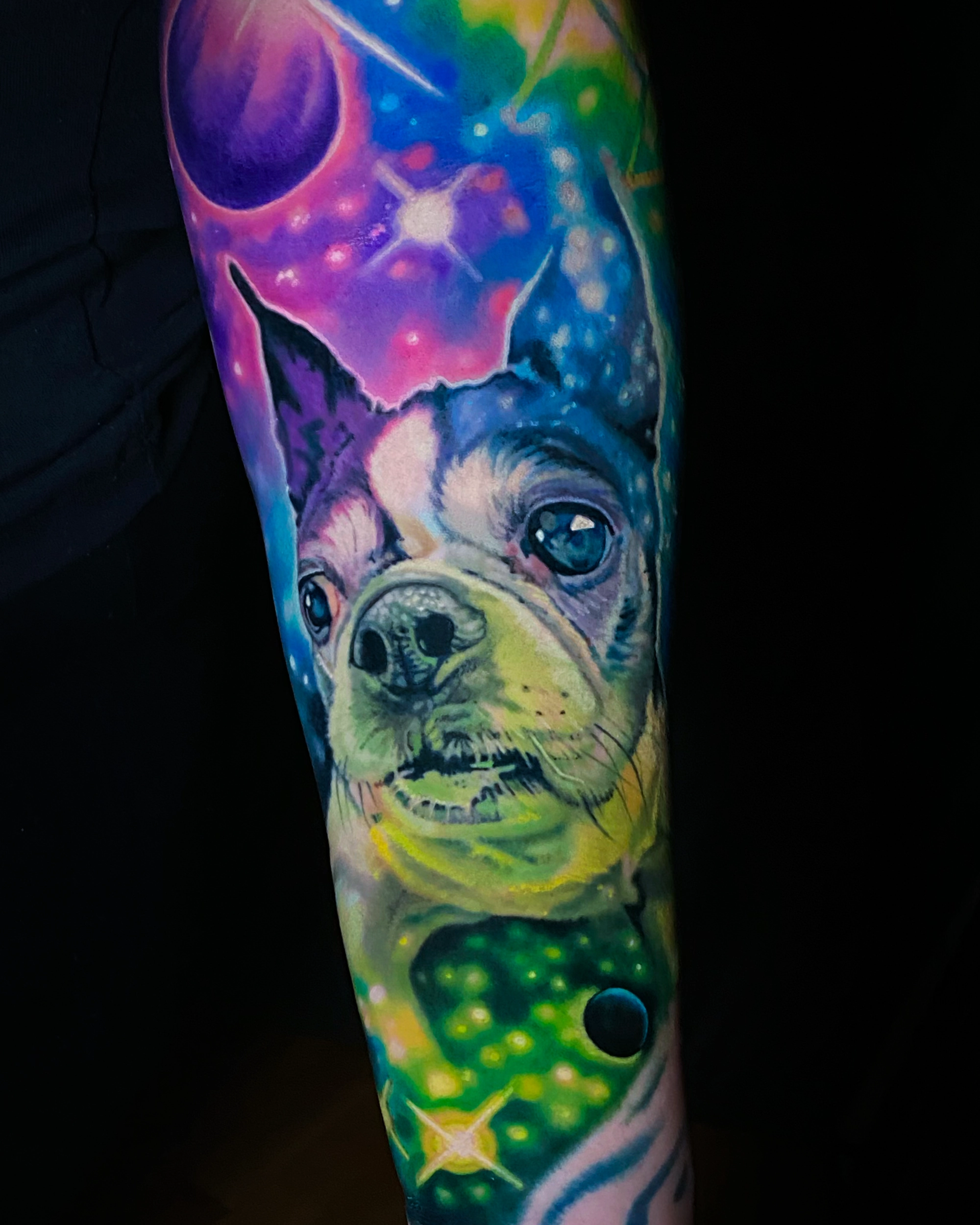 Surreal color cosmic galaxy Boston Terrier dog portrait upper arm tattoo by Austin tattoo artist Bobby Cupparo