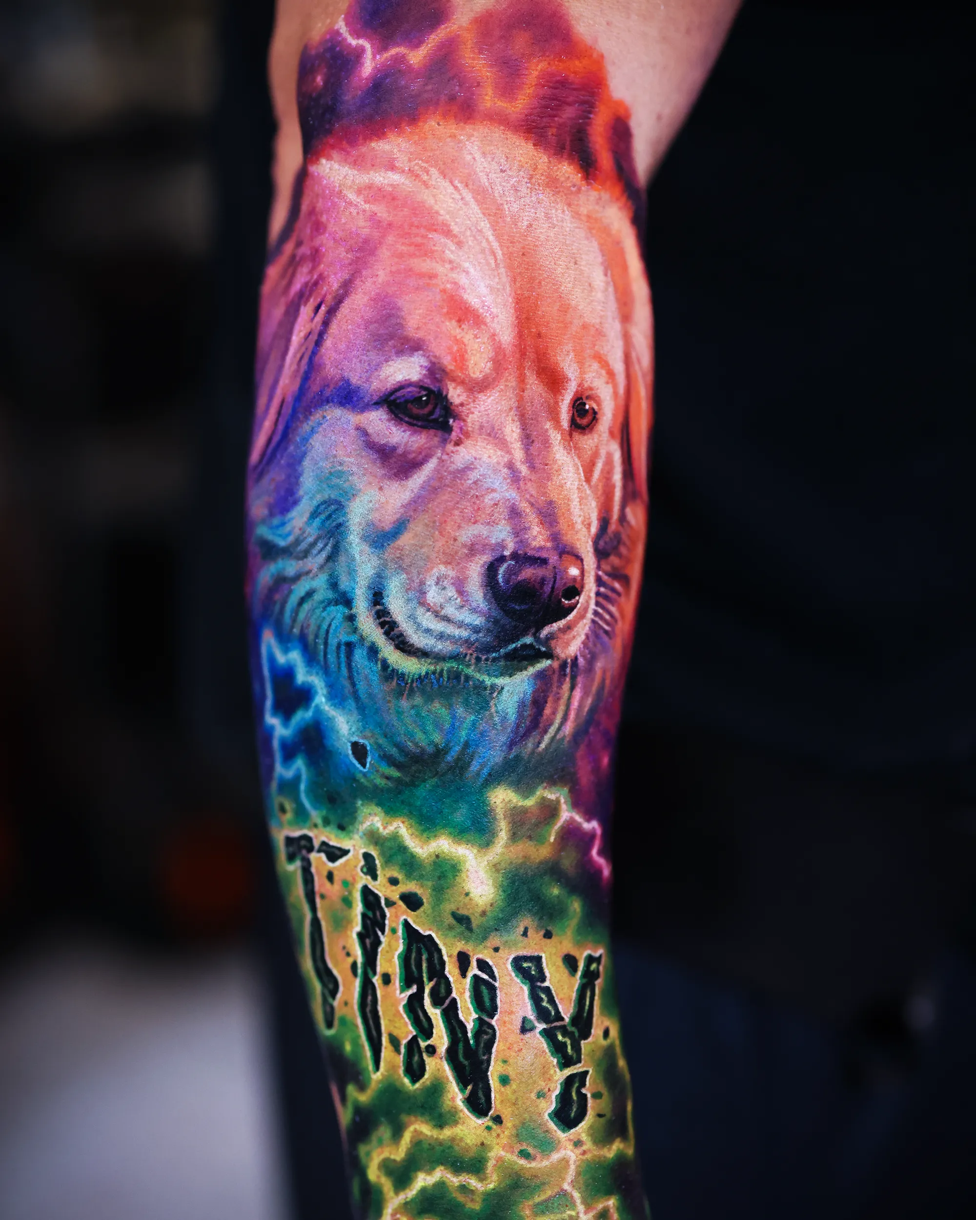 Color realism dog portrait named Tiny with electric lightning, forearm tattoo by Austin tattoo artist Bobby Cupparo