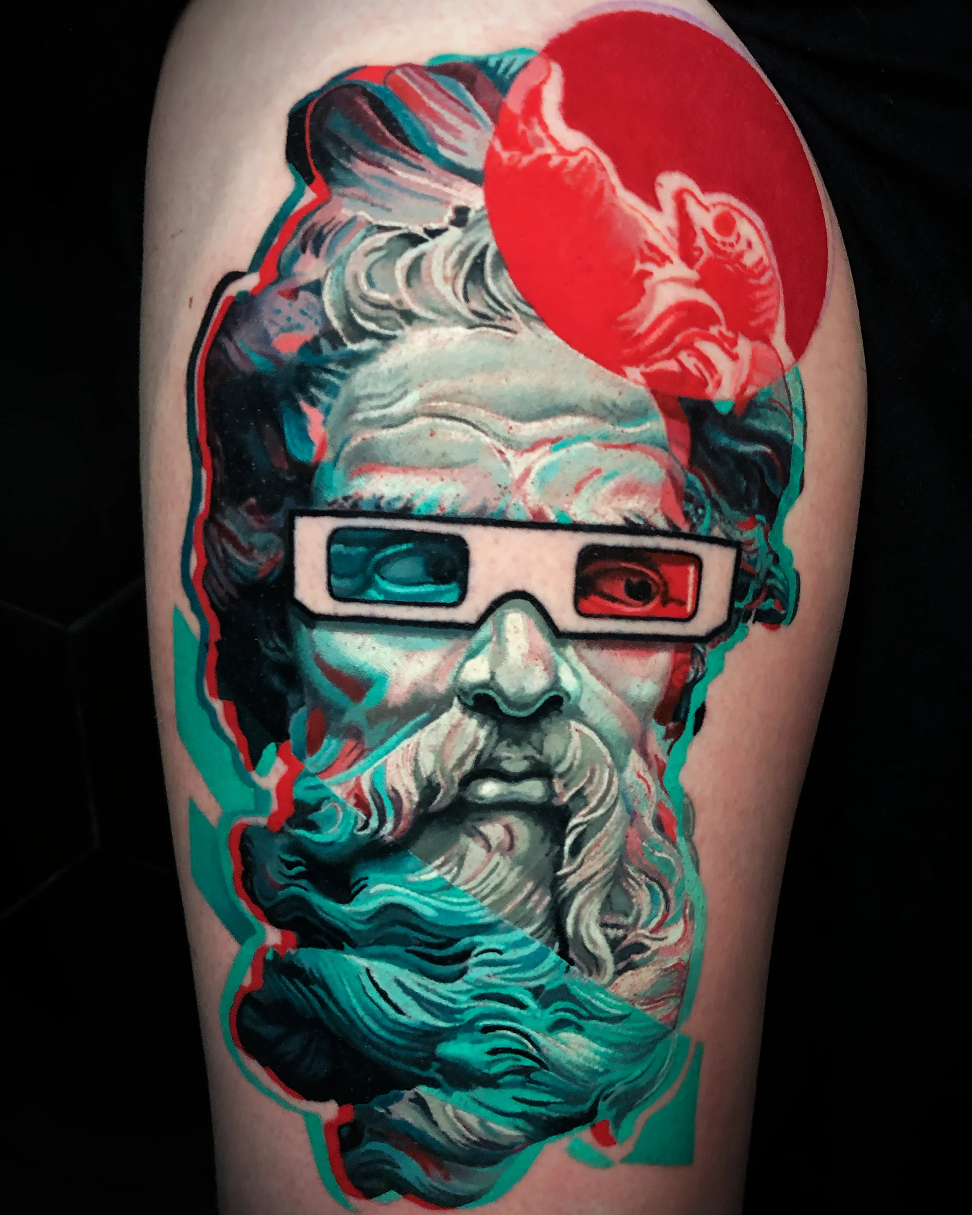 Surreal color Zeus statue with 3D glasses thigh tattoo by Austin tattoo artist Bobby Cupparo